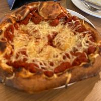 Personal thin cheese pizza from Veganiano (sorry the pic is blurry)  at XMarket & Vegan Food Hall - Uptown in Chicago