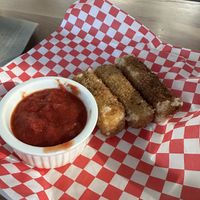 notzerlla sticks....honestly really gross we ended up taking a bite and yeah.. 🚮   at XMarket & Vegan Food Hall - Uptown in Chicago