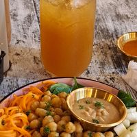 Buddha bowl and Bocas hot sauce with lemonade at El Patio in Bocas Del Toro