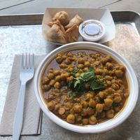 Above  - mini vegan samosas with a delicious tamarind chutney.
Below - Vegan channa masala topped with cilantro at Curry In a Hurry in Raleigh