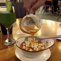 Kimchi “soup” serving by a fusion restaurant  #Veganuary at Dip Dash in Dubai