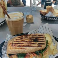 Iced latte and hummus focaccia at Paradero in Barcelona