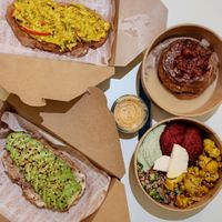 Delivery: shashuka toastie, avocado toastie, rainbow bowl, sumac strawberry pancake at Terra's Table in Riyadh