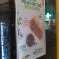 Signs advertising their vegan options at Subway in Madrid