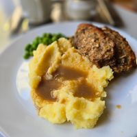 Flavorful lentil loaf with mashed potatoes at Café In The Ghetto in Brno