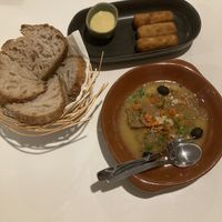 Pica pau, sourdough bread and croquettes  at A Minha Avó in Lisbon