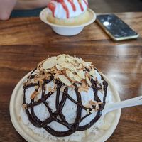 Almond Joy bowl.And Lava Flow in the background at Wailua Shave Ice Kauai in Kapaa