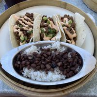 Korean Plant Tacos with beans & rice  at Fishlips Waterfront Bar & Grill in Cape Canaveral