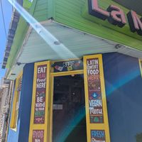Entrance mentions their vegan menu! at La Macarena in New Orleans