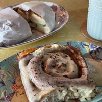 Bagel with cream cheese and cucumber, cinnamon bun   at Bury Me Standing in Cairns