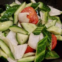 Cucumber, onions and tomatoes salad. at Naan Bar in Valletta