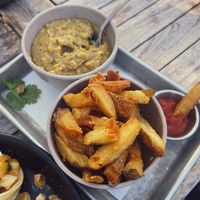 Fries and mushroom grits   at Cinder Restaurant in Westerly