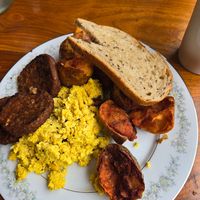 Sunday brunch platter (tofu scramble, vegan sausage, rye bread, and crispy potatoes) at Elk Creek Cafe and Aleworks in Millheim