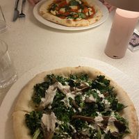 Truffle and margarita pizza  at MUDRA Plant Based  in Madrid