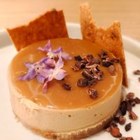 Cheesecake con dulce de leche de coco. Muy rico at MUDRA Plant Based  in Madrid