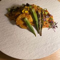 Pad Thai tempeh - Stir-fried rice noodles in spicy cashew sauce, vegetables, grilled tempeh, nuts and roasted pak choi. 5-6 bites maximum - VERY small for a main dish. at MUDRA Plant Based  in Madrid