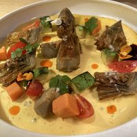 Tiradito de alcachofas  at MUDRA Plant Based  in Madrid