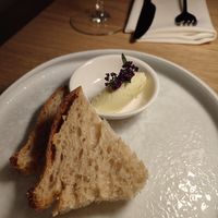 Courtesy bread and butter starter at MUDRA Plant Based  in Madrid