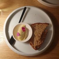 Complimentary bread with coconut mango btter at MUDRA Plant Based  in Madrid