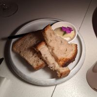 bread with coconut margarine at MUDRA Plant Based  in Madrid