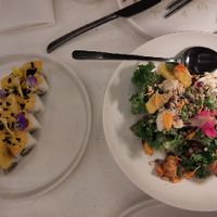 Amazonia rolls and Kale salad half eaten already at MUDRA Plant Based  in Madrid