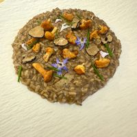 Chanterelle mushroom and truffle risotto   at MUDRA Plant Based  in Madrid