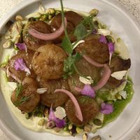 Miso onion starter  at MUDRA Plant Based  in Madrid