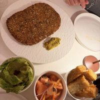 Schnitzel to share with sides  at MUDRA Plant Based  in Madrid