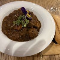 Bourguignon. The meatballs in it tasted very processed. Probably shop bought.   at Amberes The Vegetarian Wine And Cocktail Bar in Valencia