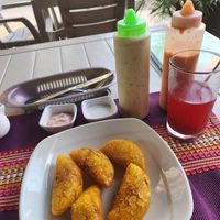 empanadas de papas con todas las salsas at Las Veganas in Medellin
