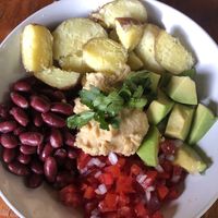 Buddha Bowl with potato instead of couscous (24k)  at Muti in Entebbe