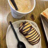 Iced vegan milk coffee and a chocolate pasty  at Chay 365  in Ho Chi Minh City