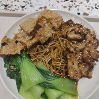 Noodles with faux meat and pak choi at Nyonya Vege in Kuala Lumpur