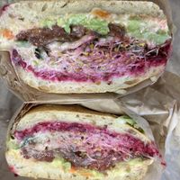 The happy hippie minus the cheese and request ciabatta to make it vegan - so good!   at Mendocino Farms in Roseville