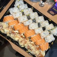 Avocado roll, spicy salmon roll, Japanese bagel roll, and Kona roll (top to bottom)  at Gorilla Eats Sushi in San Diego