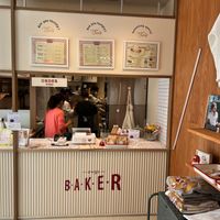 The store with some seating inside and outside  at OVGO B.A.K.E.R. - Meiji st. in Tokyo