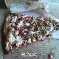 Hufe piece of pizza. at The Joint Pizzeria in Victoria