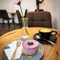 Wild berry vegan raw cake & oat milk flat white  at Ukiyo Coffee in Mainz