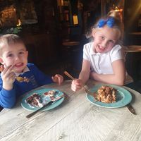 Kids enjoying a stack of biscotti pancakes and vegan Nutella and squiry cream (personal request) at Grind House Bawtry in Doncaster