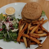 Le succulent burger Champoulet frit avec salade et frites. at Chez Victor - St Jean in Quebec