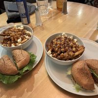 Mushroom burger with poutine and vegetator with poutine   at Chez Victor - St Jean in Quebec