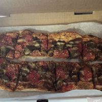 Meat lovers pizza with ranch on the side   at Florish in Tampa
