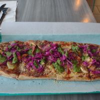 Build your own, pickled cabbage, pesto drizzle, pineapple, artichoke, mushroom, pepperoni. at Florish in Tampa