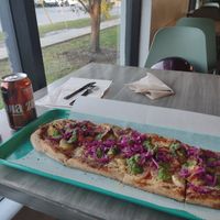 Build your own, pickled cabbage, pesto drizzle, pineapple, artichoke, mushroom, pepperoni. at Florish in Tampa