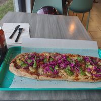 Build your own, pickled cabbage, pesto drizzle, pineapple, artichoke, mushroom, pepperoni. at Florish in Tampa