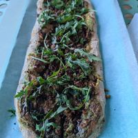 Sausage Pesto flatbread with hot date drizzle at Florish in Tampa