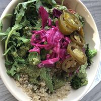 Quinoa and kale power blend, house made bbq pulled jackfruit , citrus roasted broccoli , pesto , lime pickled cabbage, pickled jalapeño , avocado,arugula   at Florish in Tampa