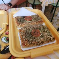 Pizza with vegan cheese, zuchinni, tomato sauce, tomato and Provence herbs at Klub Makrovega in Rijeka