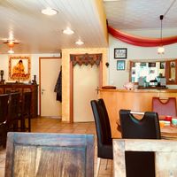 The inside of the charming restaurant at Maharadja Chez Chander in Sion