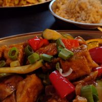 Orange tofu with side of brown rice at Heart and Soy in Louisville